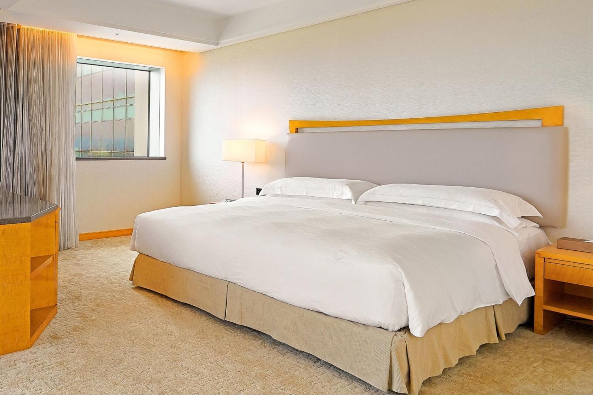 Windsor Hotel Taichung Habitación foto A bedroom at the hotel